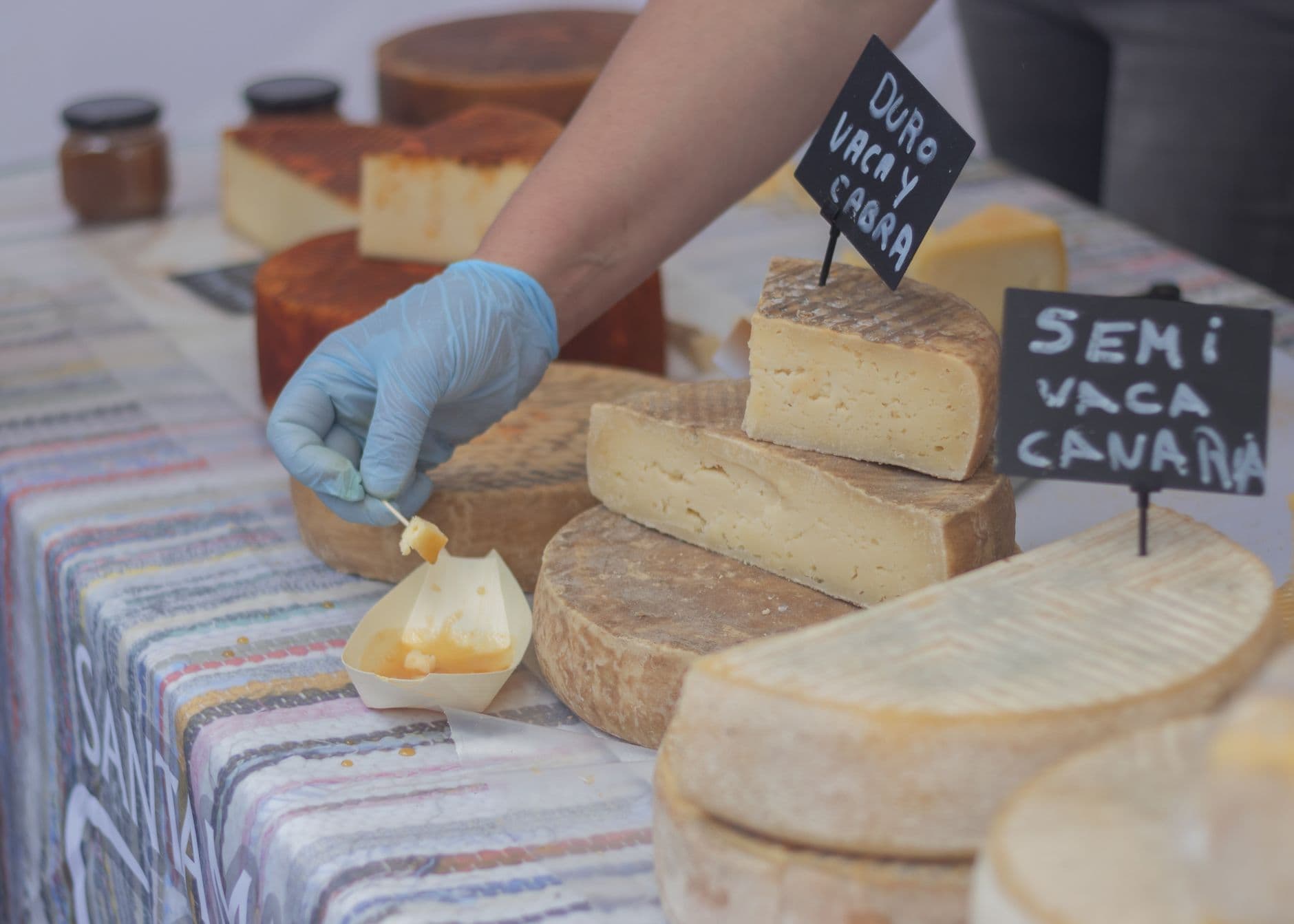 Food and beverage brands sampling their products at an expo stall